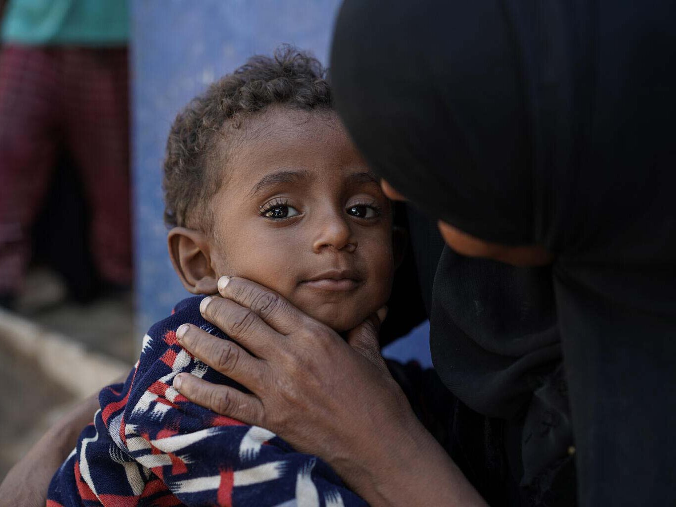 Kind und seine Mutter aus dem Jemen.