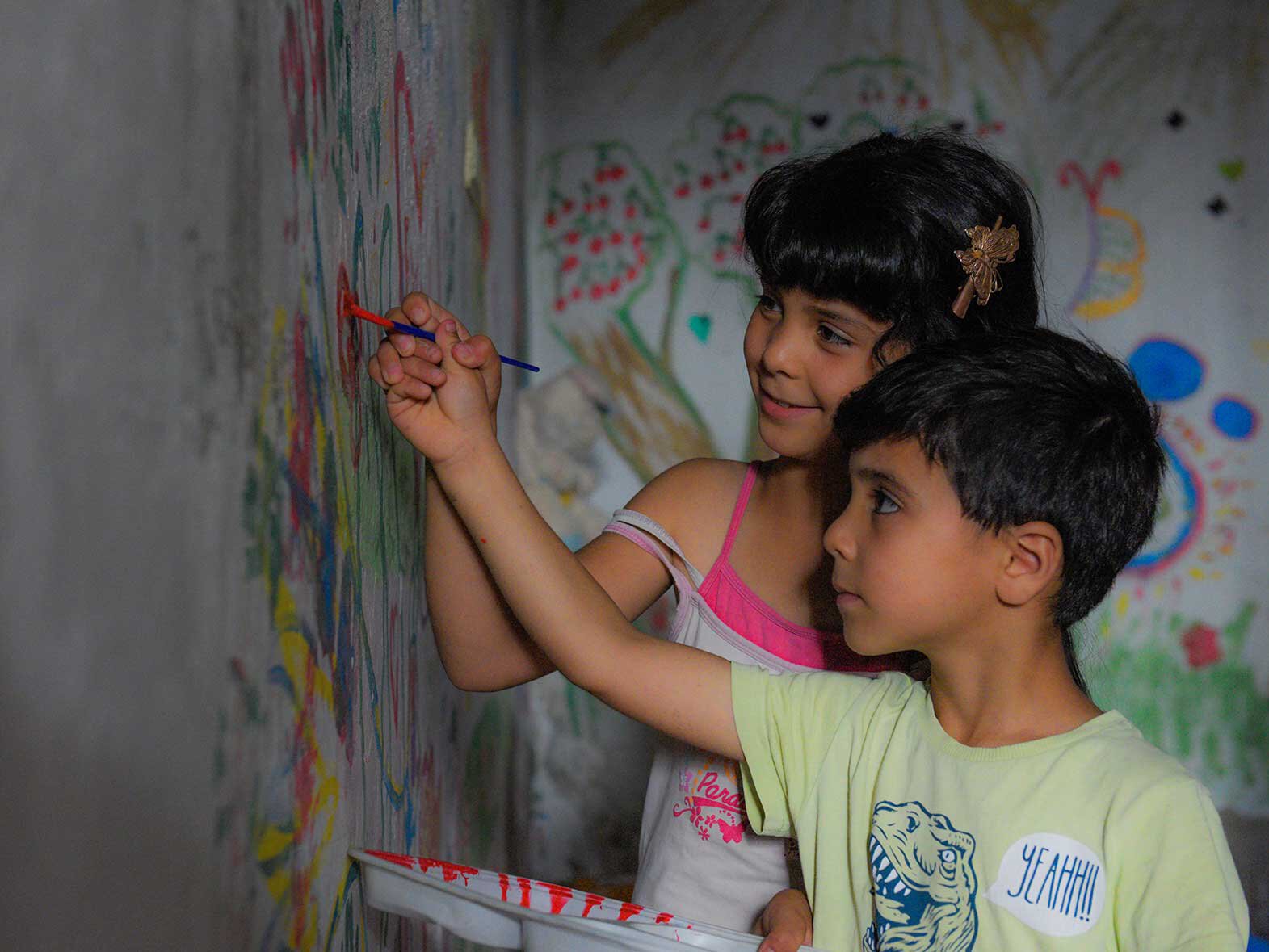 Syrische Kinder malen um die Traumatisierung aufzuarbeiten.